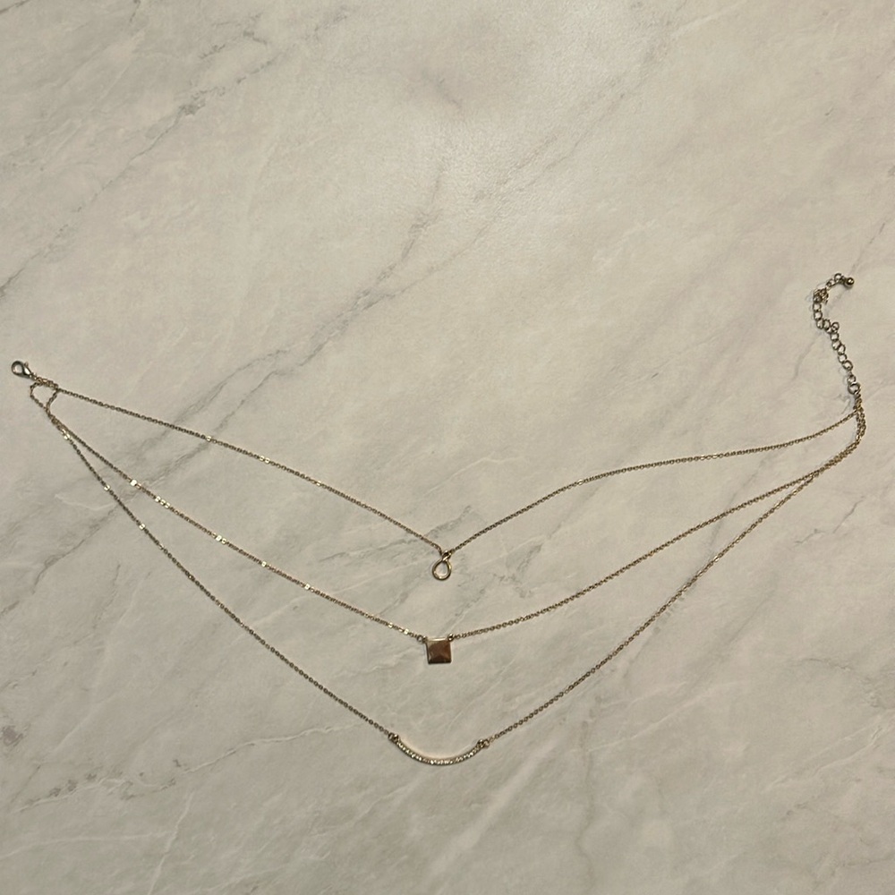 Gold three layered tiered necklace